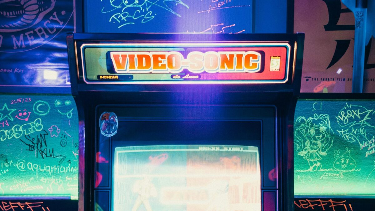 Vintage arcade machine glowing with neon lights